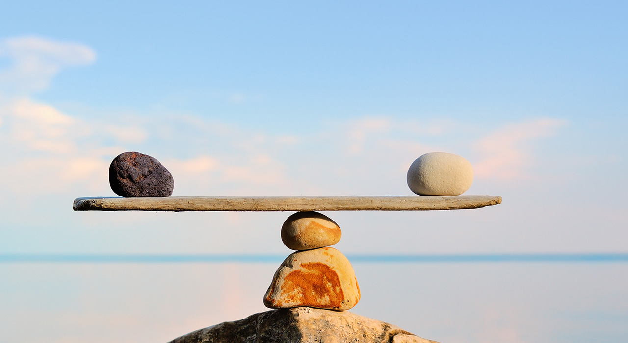 how-can-i-balance-the-material-and-spiritual-aspects-of-life-img balancing rocks