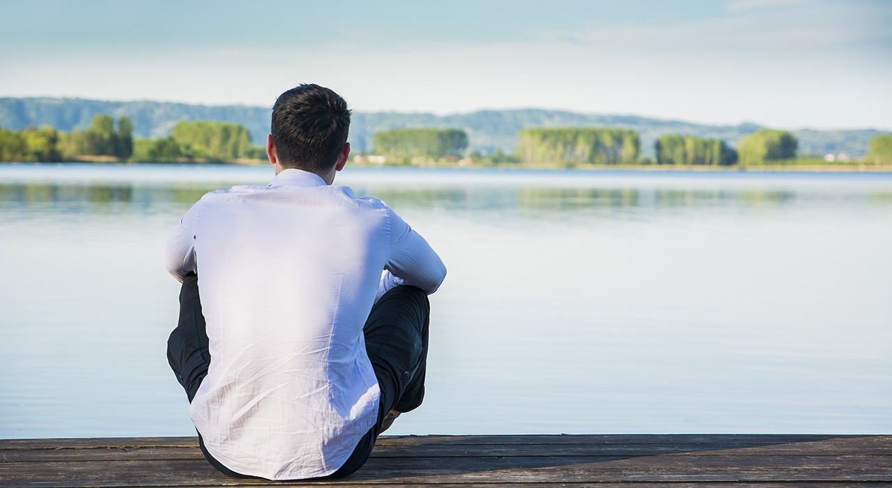 must-be-spiritual-in-order-to-practice-img man sat on the rive side & doing heartfulness practice