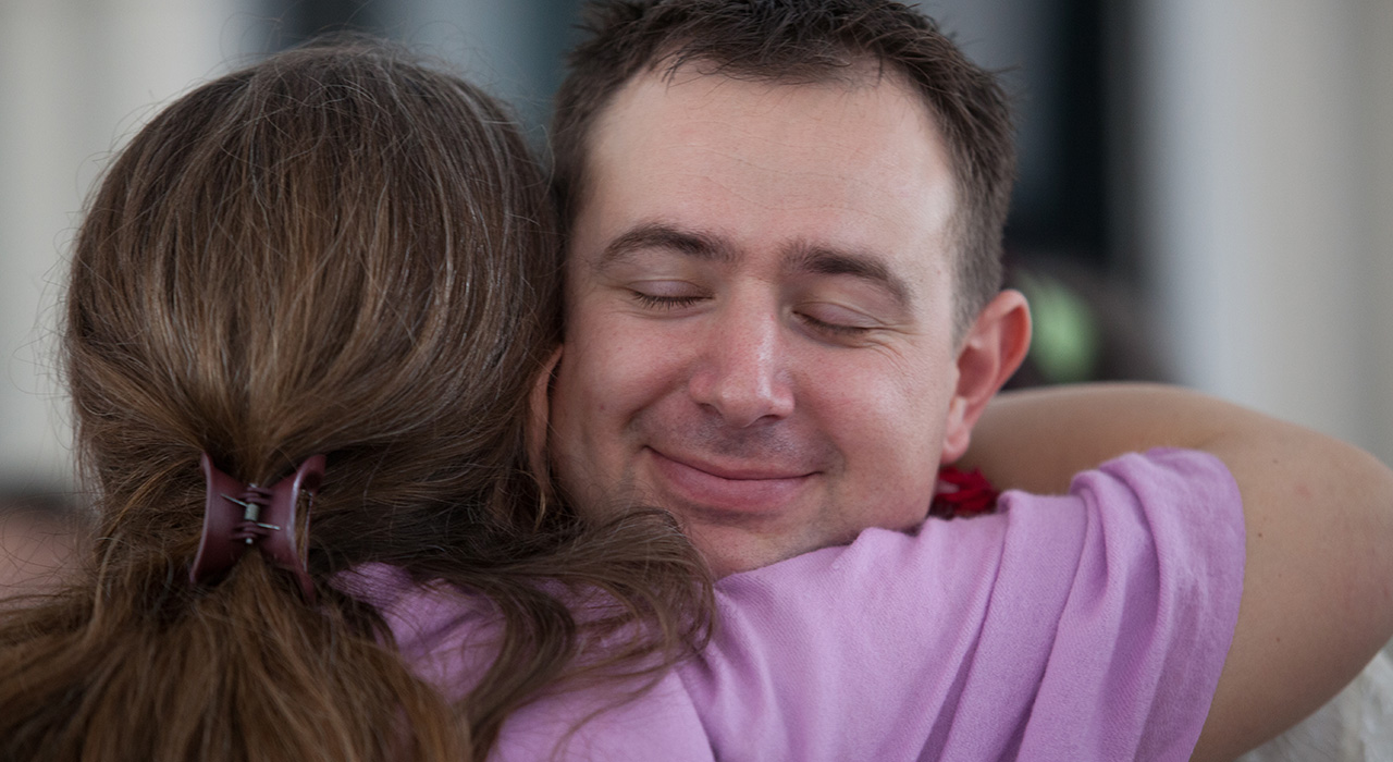 dissolve-anger-img man and woman hugging each other